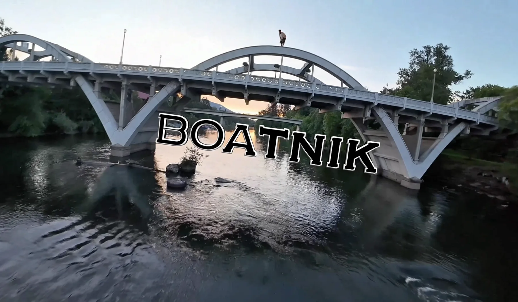 Drone view of Boatnik festivities and the Rogue River beneath Caveman Bridge in Grants Pass